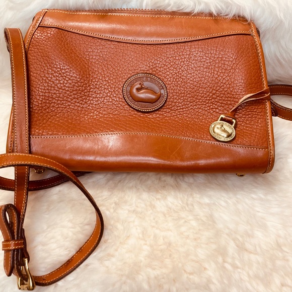 Dooney & Bourke Handbags - Dooney & Bourke cross body bag in brown.